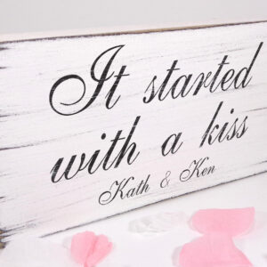 personalised it started with a kiss wedding sign